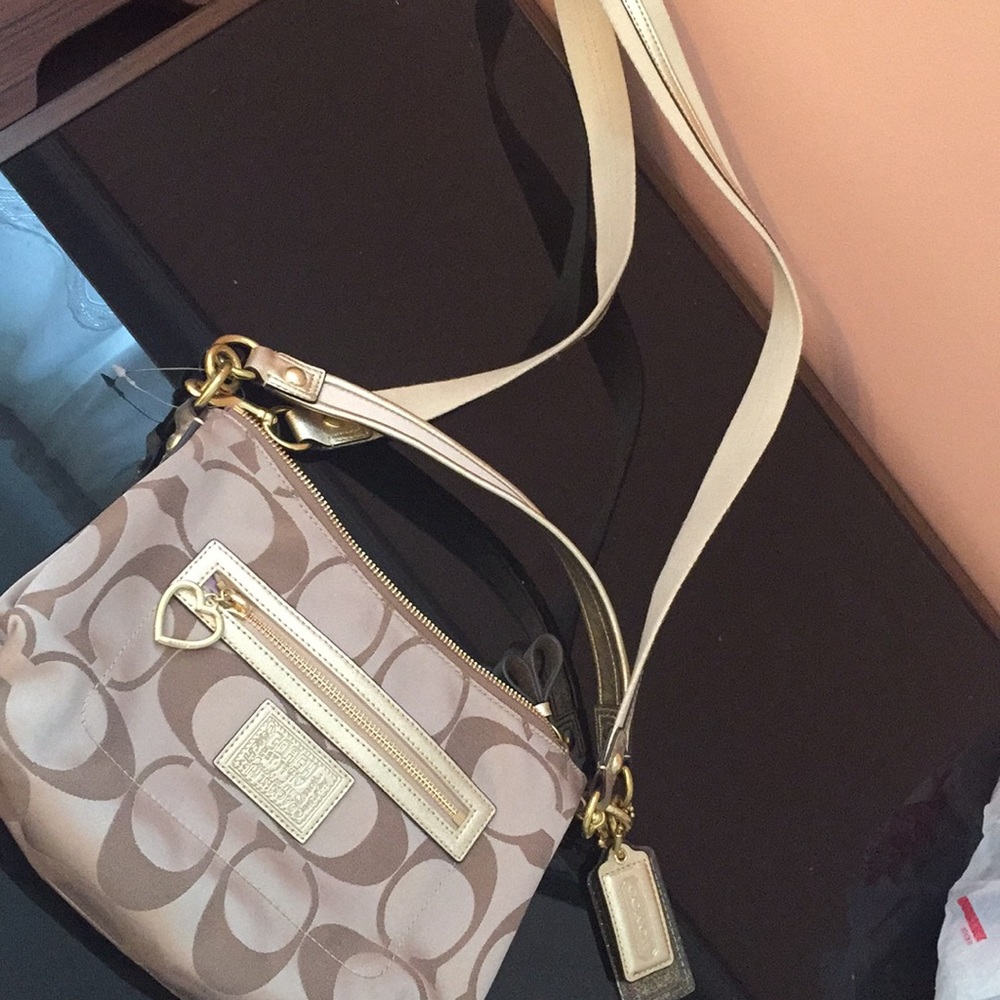Gold COACH crossbody bag